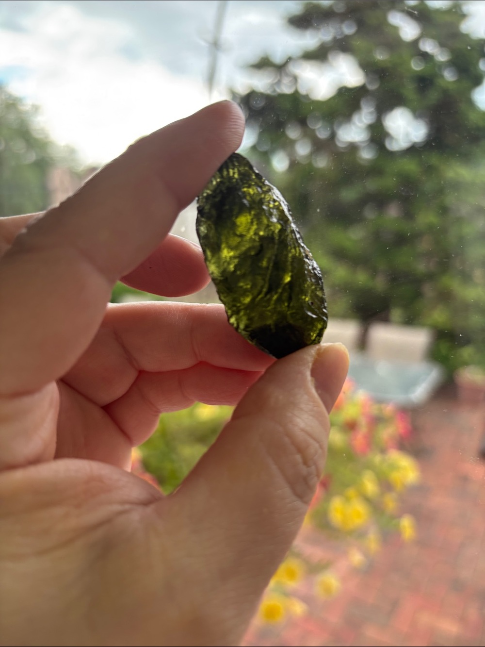 Moldavite: Translucent Olive Green Handheld Crystal, approx 2”long and 1/2” wide